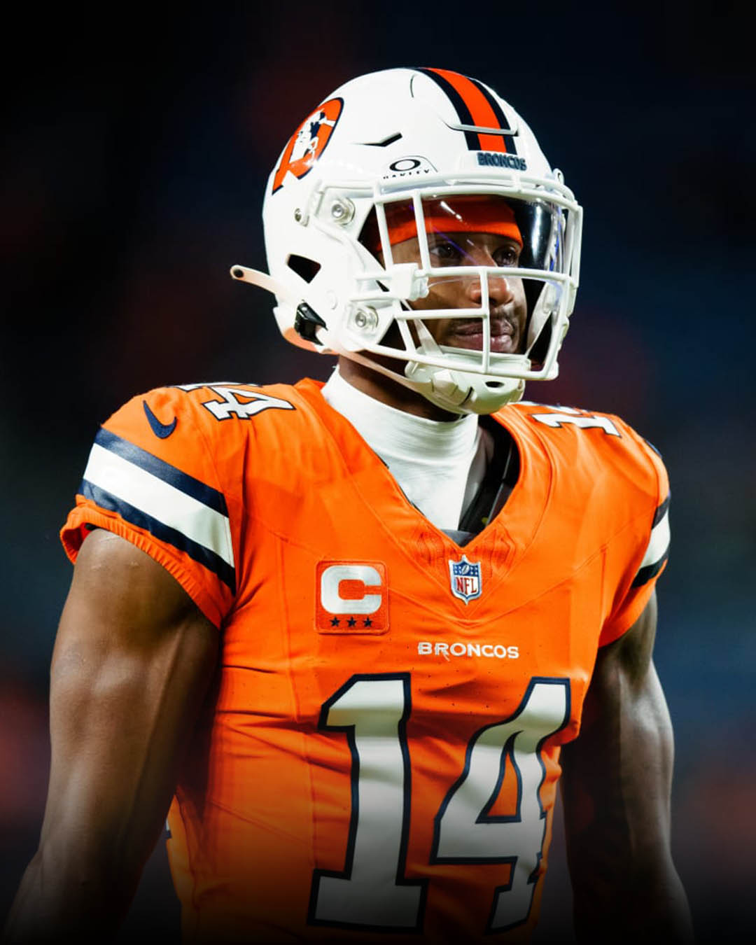 Courtland Sutton stands on the field in full Denver Broncos uniform, looking focused during a 2024 game where he led the team in receiving yards and touchdowns amid ongoing contract extension talks.