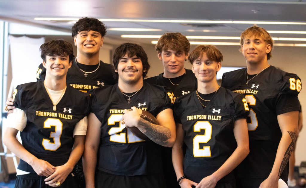 Thompson Valley Eagles football players and coaches pose for photos during CHSAA Media Day 2025.