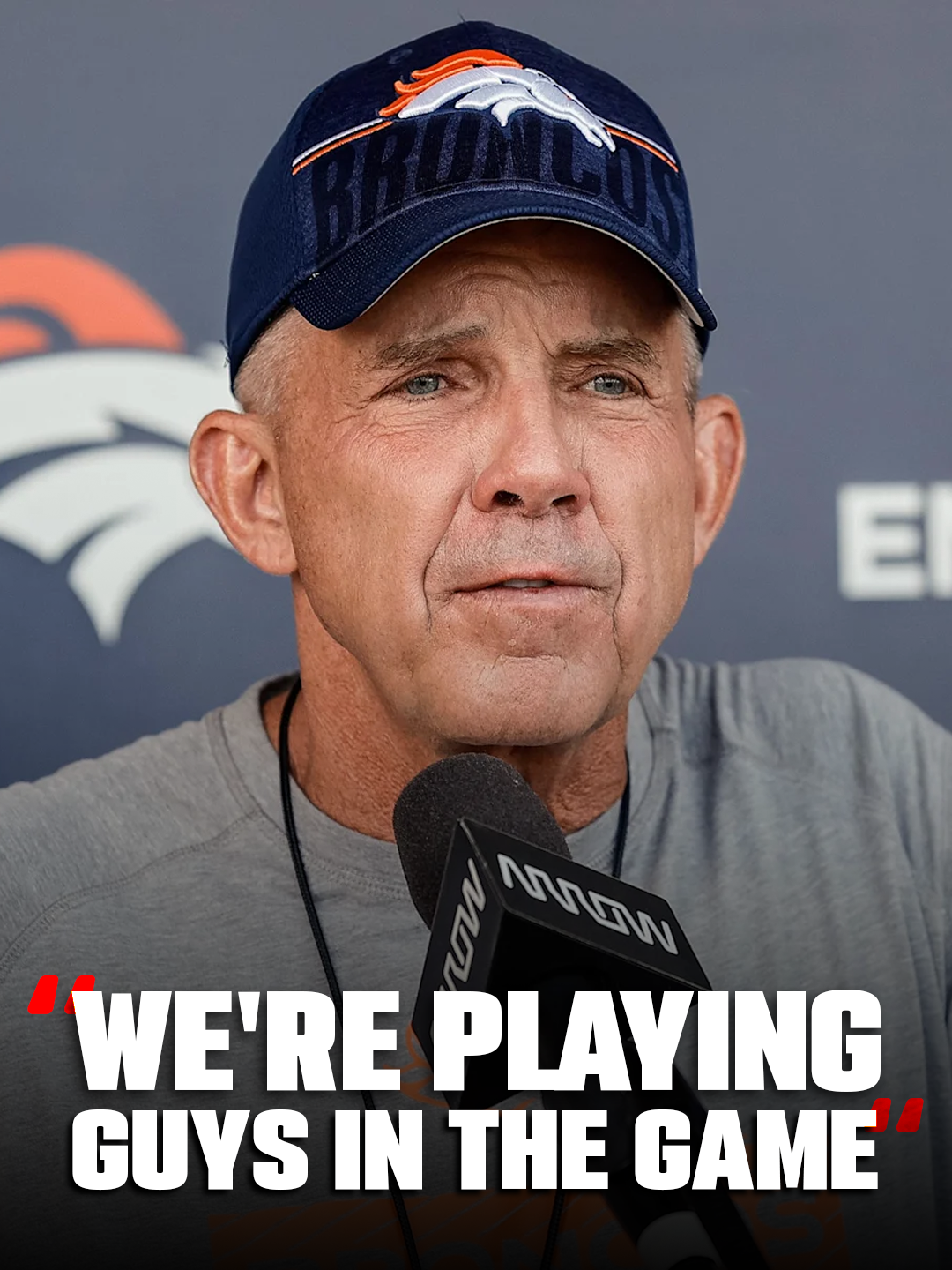 Denver Broncos head coach Sean Payton watches practice at training camp in Englewood, Colo., as the team prepares for joint sessions with the San Francisco 49ers.